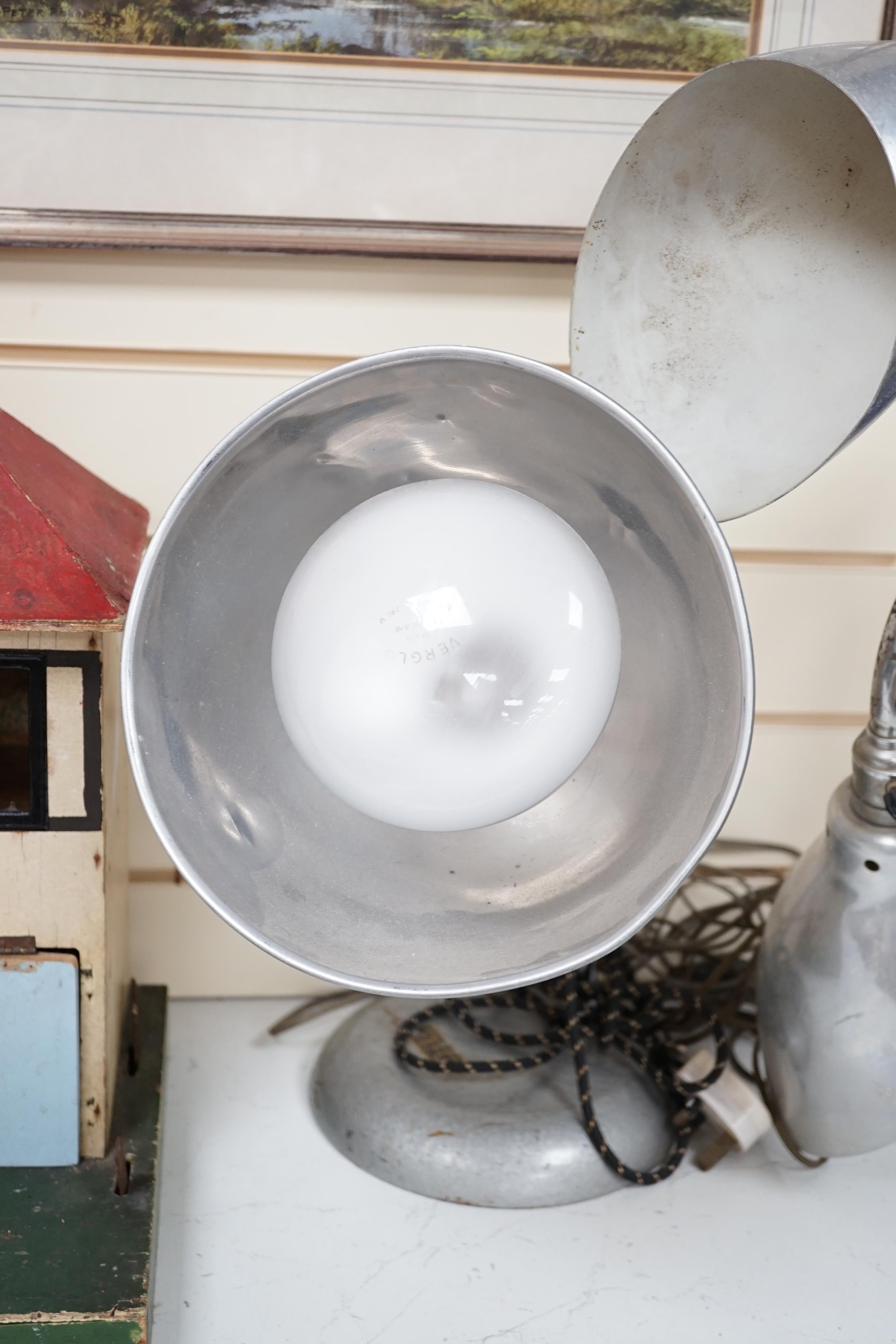 A mid-century Stephen Glover Verglo desklamp, and a pair of French Ki-E-Klair clamp-fitting industrial lamps